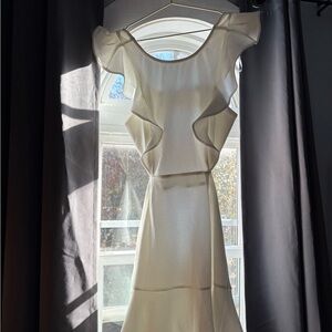 White ruffle open back dress